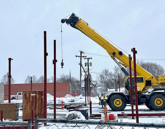 crane in place for lifting steel beams