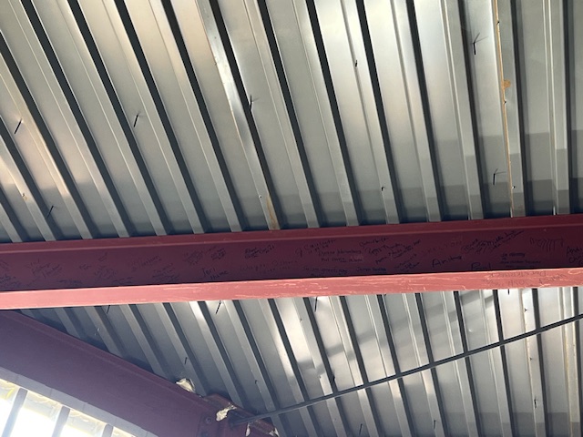 signed beam installed